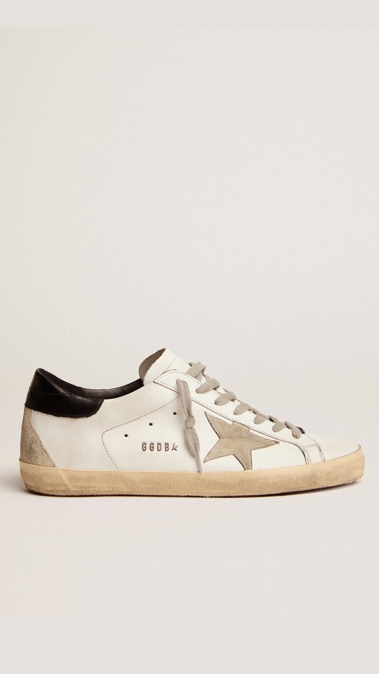 Golden Goose Super Star blanco con estrella gris / talón negro
