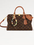 LV Speedy 30 con dije de Aeropuerto