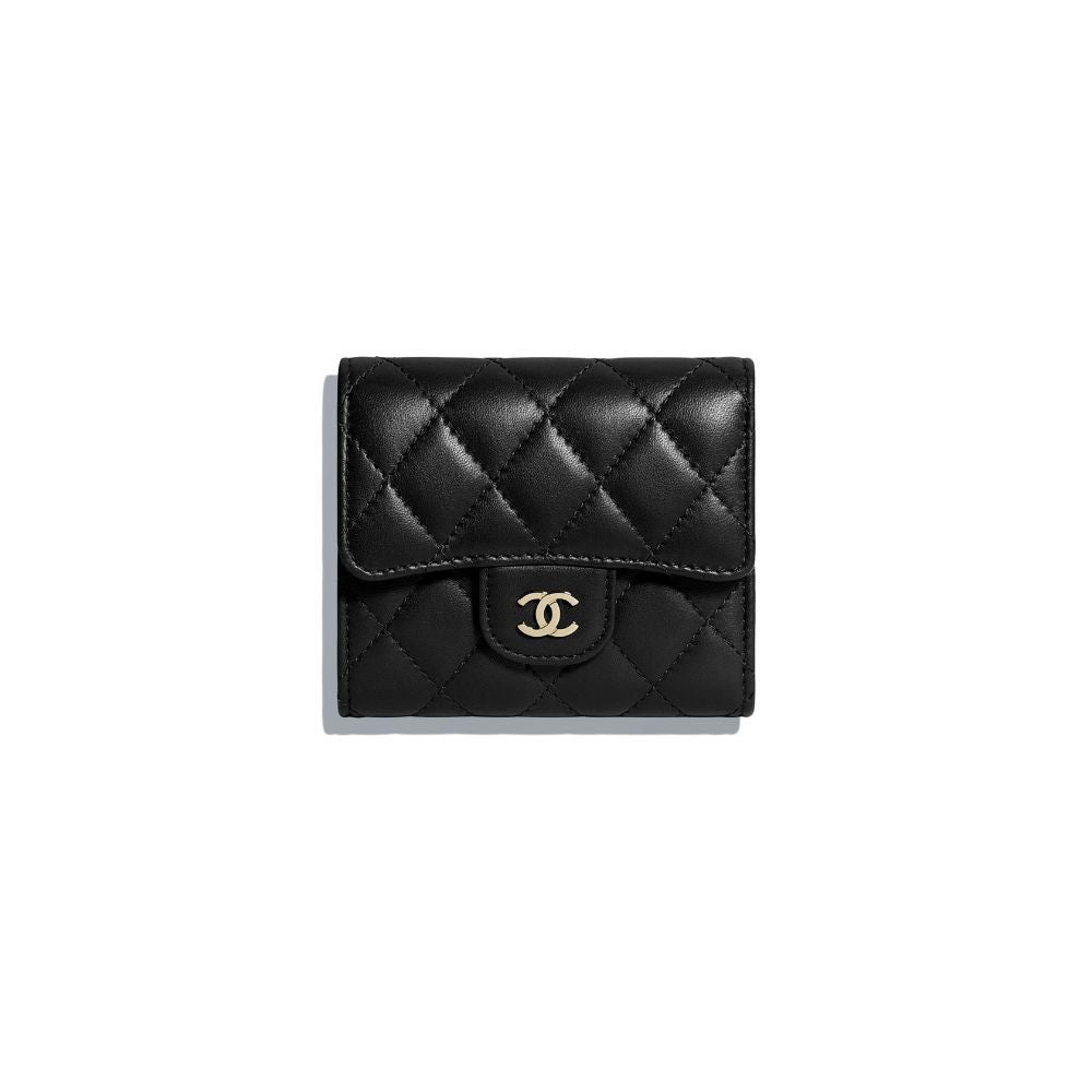 Chanel Classic Flap triple bolsillo